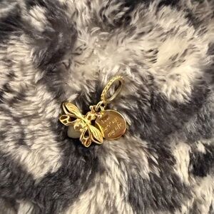 PANDORA gold glow in the dark firefly charm